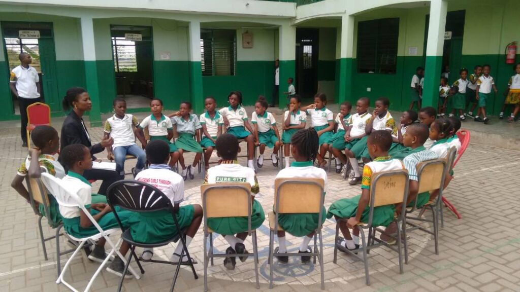 Students seated during club discussion