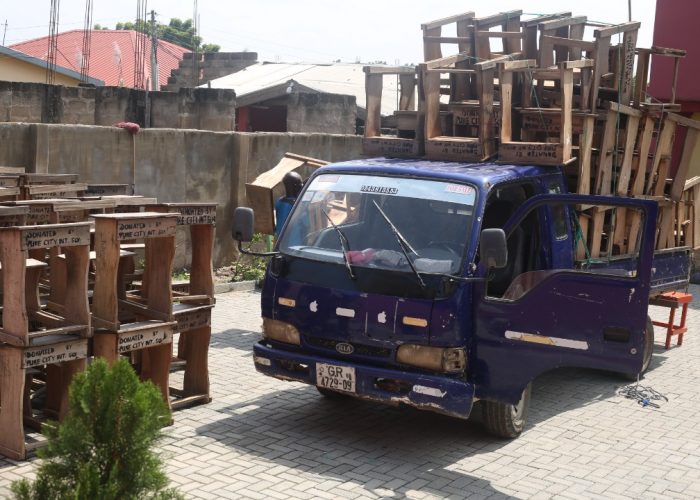 desks being loaded at PCIS for donation to Nsakina Basic School