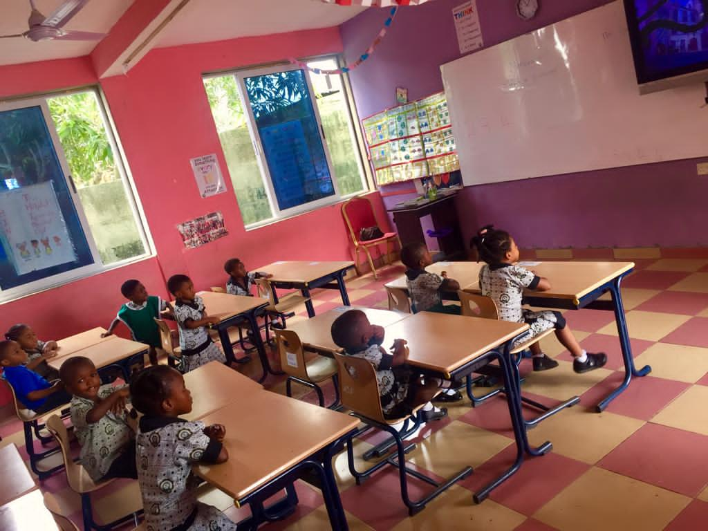 children seated in the class